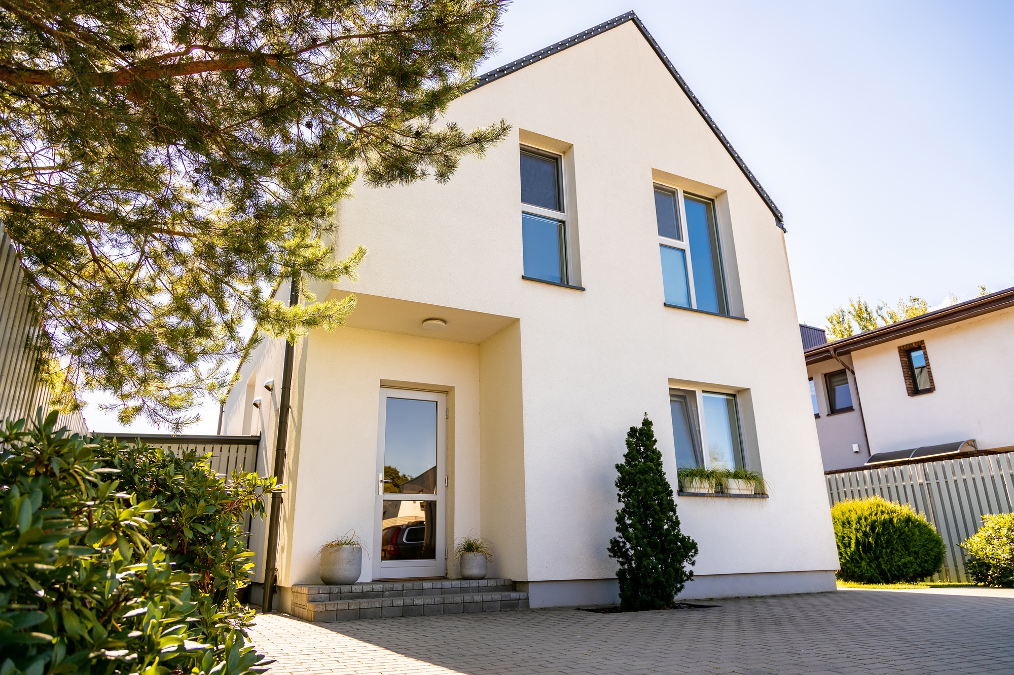 Outside view of a simple private contemporary house in a residential district